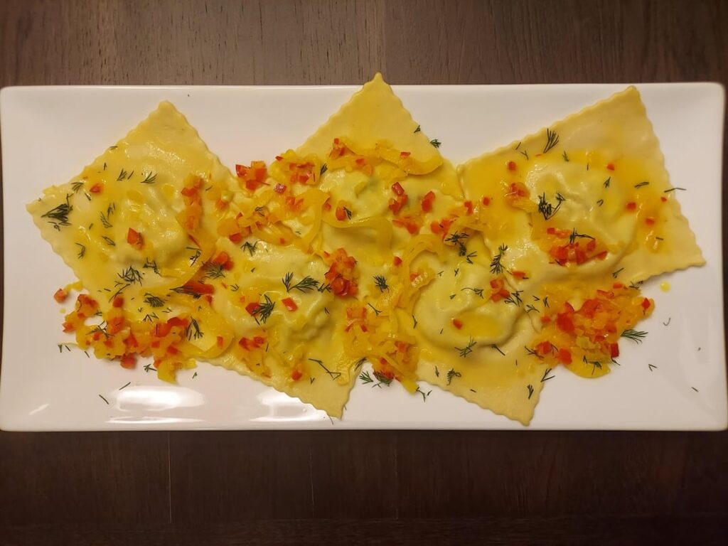 Crab Ravioli in a Saffron Chili Butter Sauce. First and last time making ravioli.