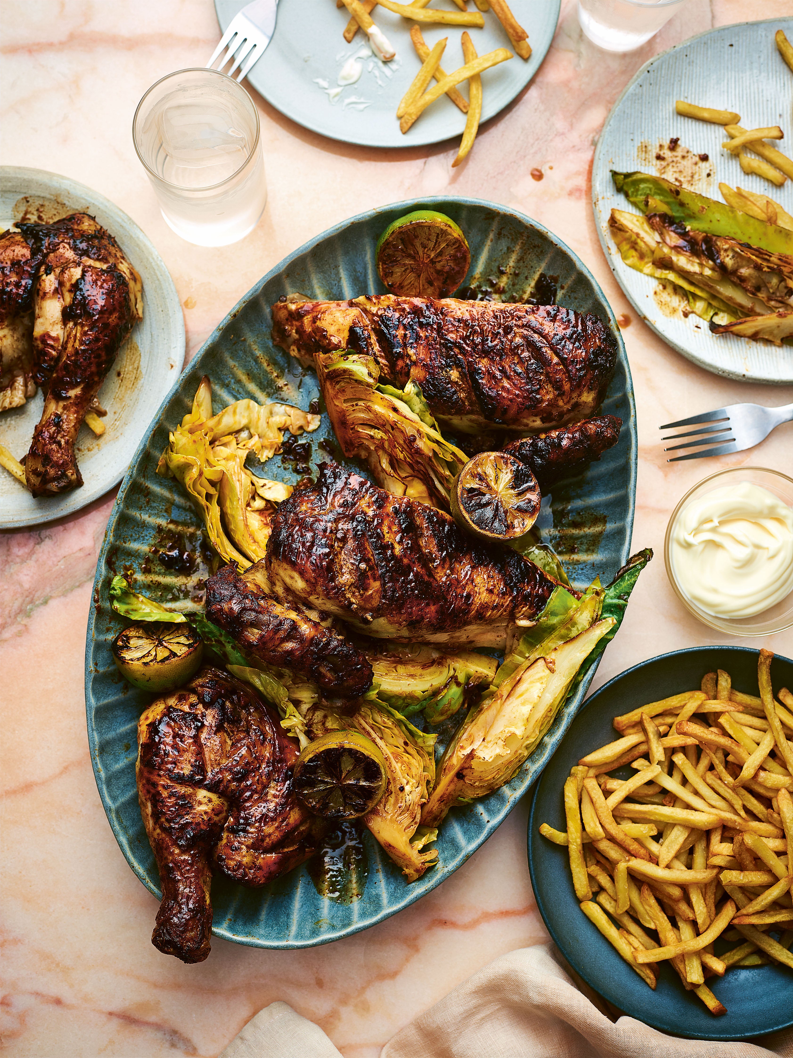 Pressed flat under a weight so the skin turns deeply crisp, with smoky chipotle cabbage soaking up the juices