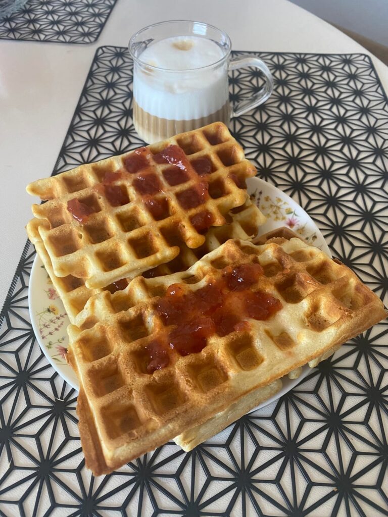 Waffles with strawberry jam and latte macchiato 🧇 (today I used a new waffle maker for the first time)