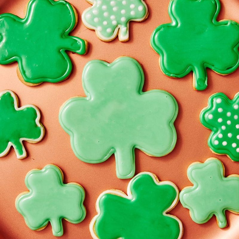 shamrock cookies on an orange plate