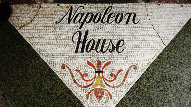 Decorative tiles on the entry step of New Orleans' Napoleon House.