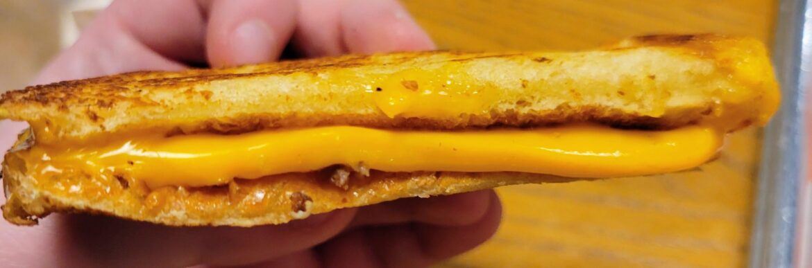 Grilled cheese time. We have Tillamook cheddar mixed with American on potato bread.