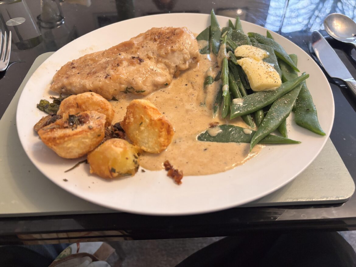Chicken in white wine, cream & tarragon sauce.