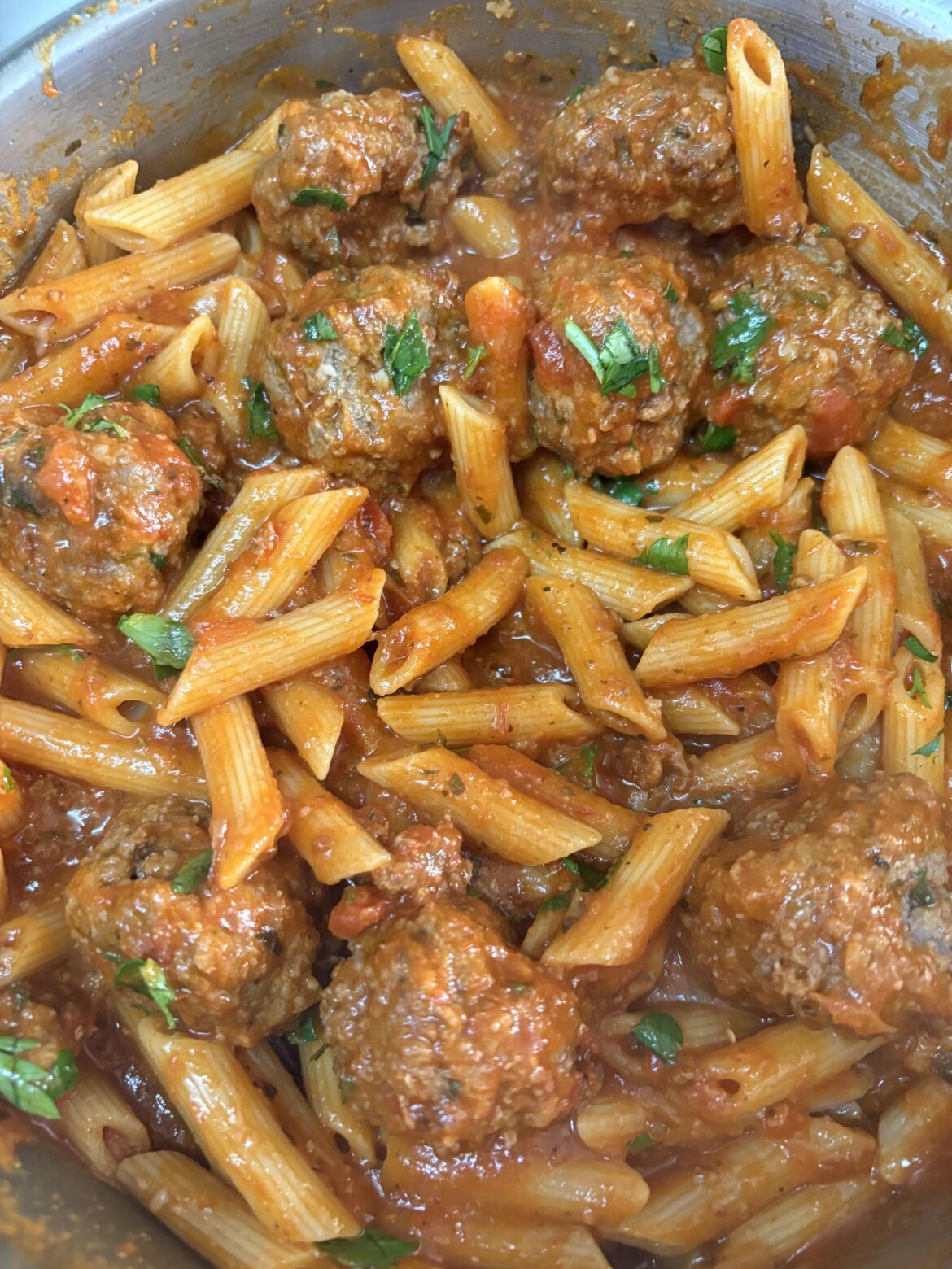 Penne and home made meatballs with tomato sauce