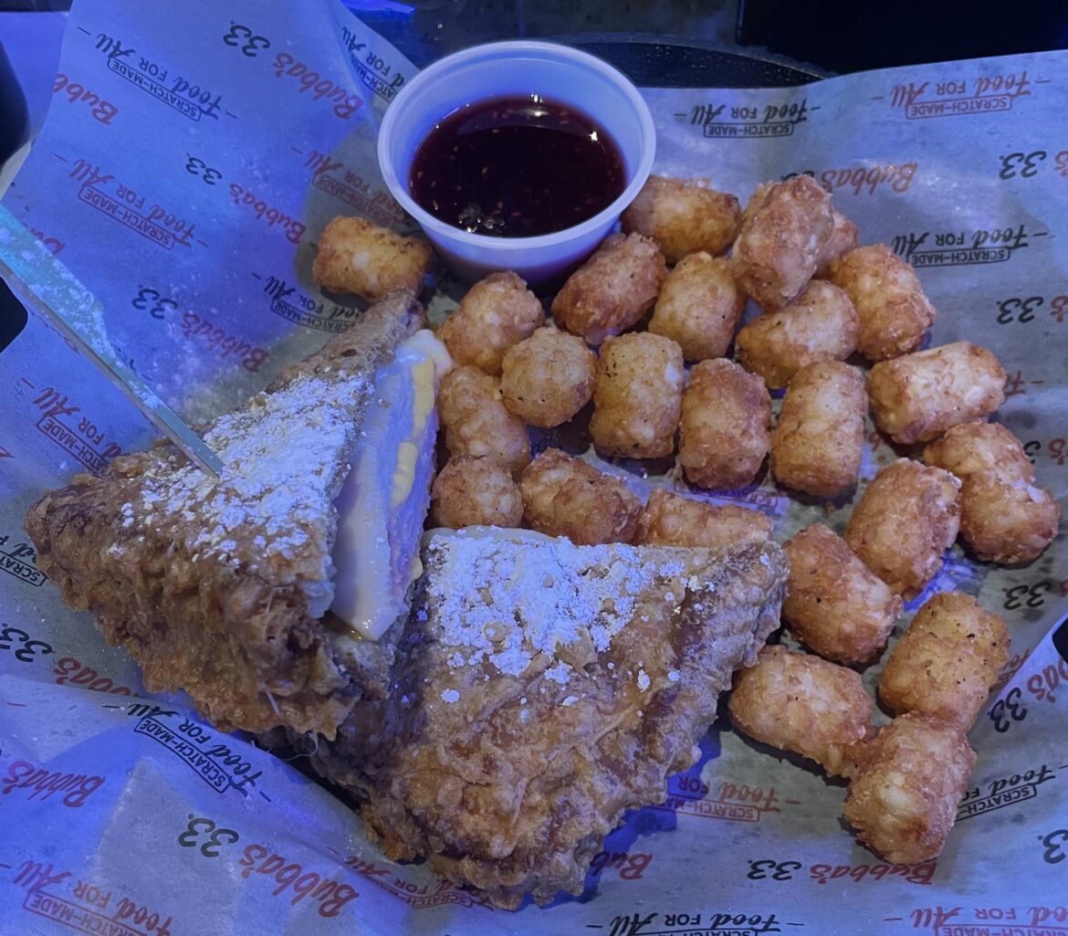 [i ate] a Monte Cristo sandwich (deep fried ham & cheese sandwich dusted w/ powdered sugar) + tater tots & raspberry preserve