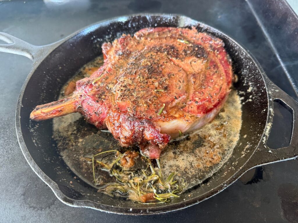 Cowboy ribeye smoked, seared and basted