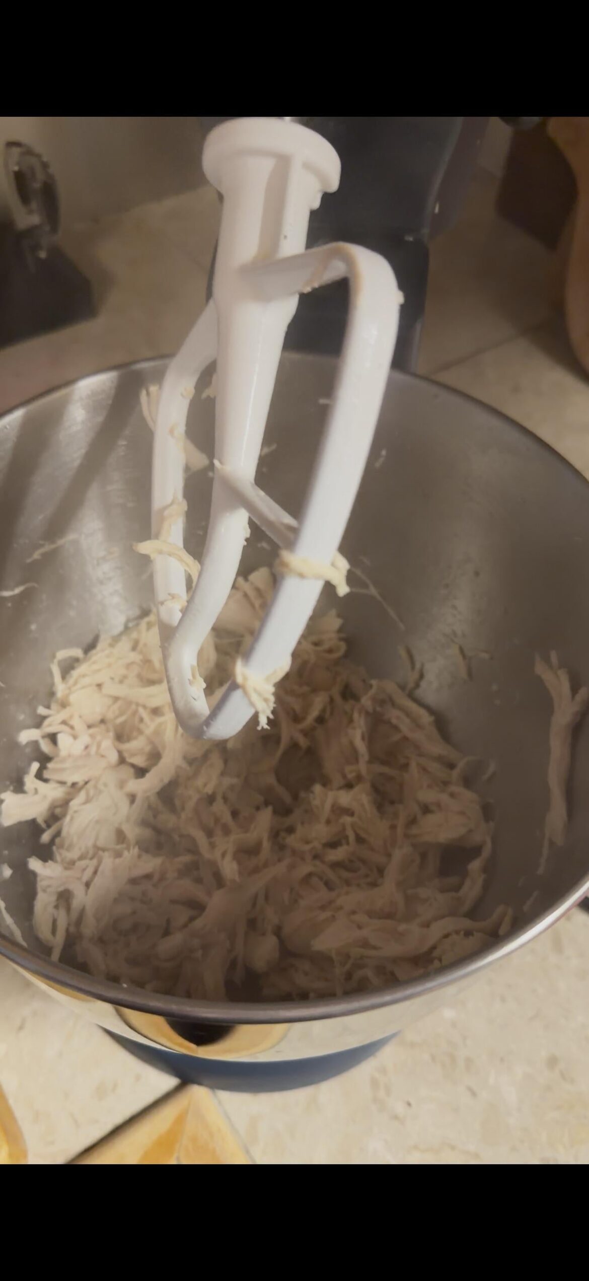 Use a kitchen aide to shred chicken insanely fast