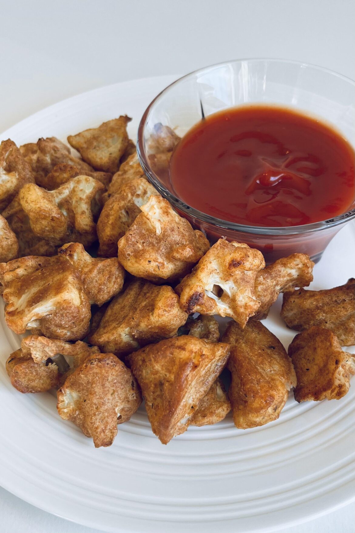 Crispy baked battered cauliflower bites