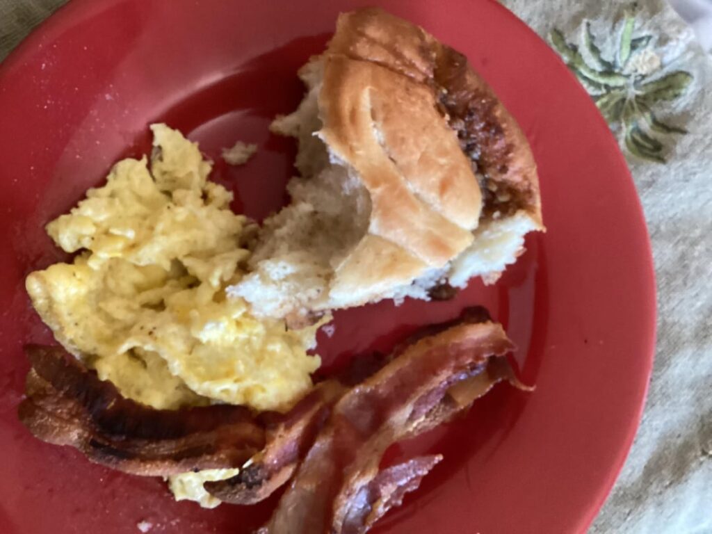 Soft Cinnamon Rolls with bacon and eggs