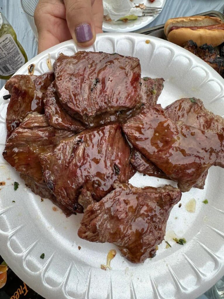 Fresh off the grill, garlic-herb glazed grilled steak.