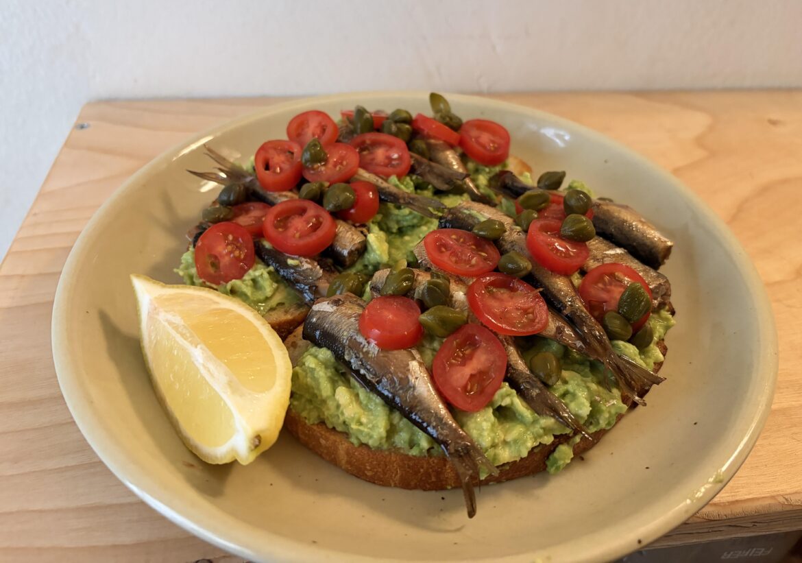 Made an avocado toast with smoked sprats, tomato, and capers
