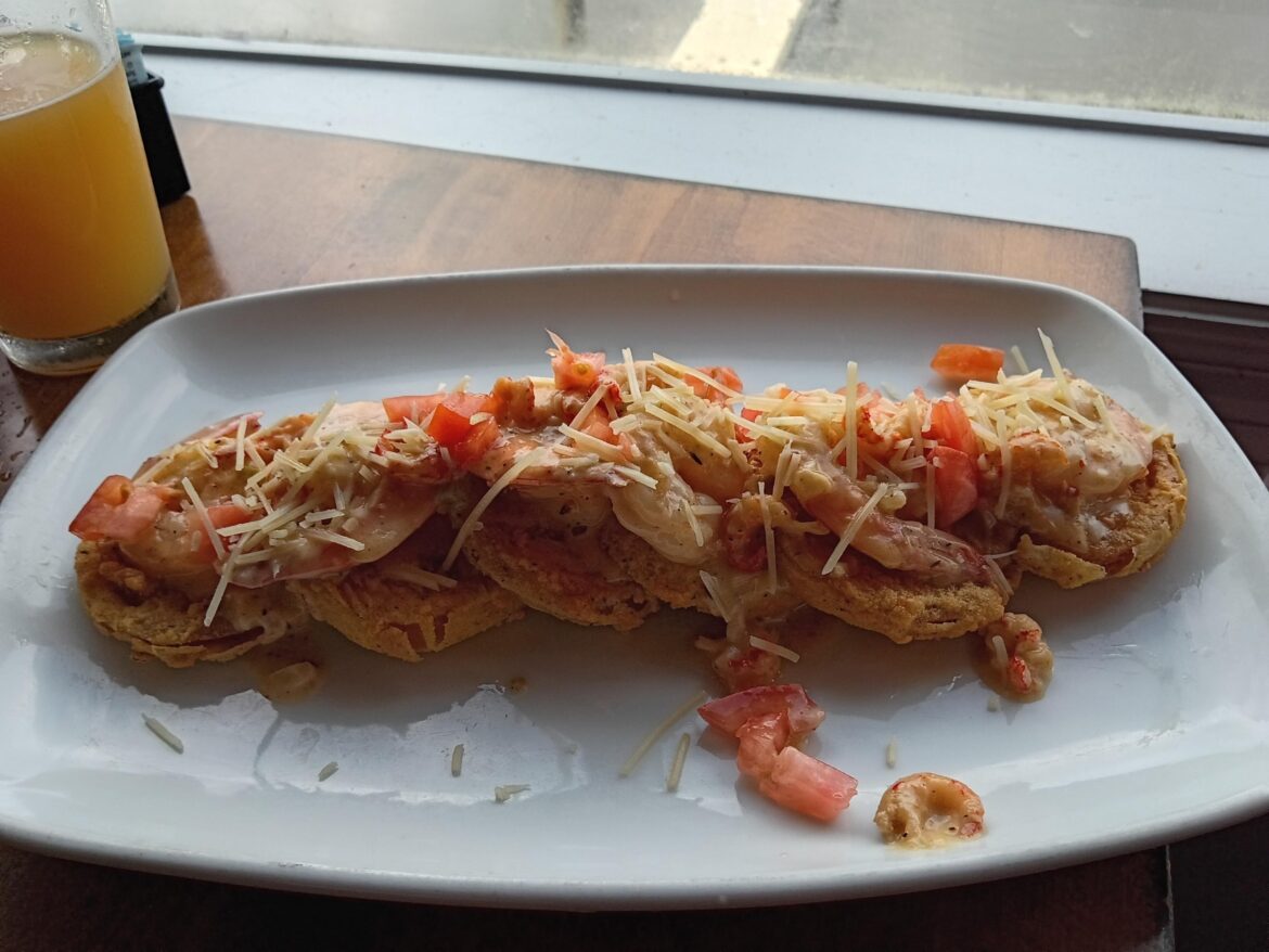 Fried green tomatoes topped with shrimp and crawfish remoulade