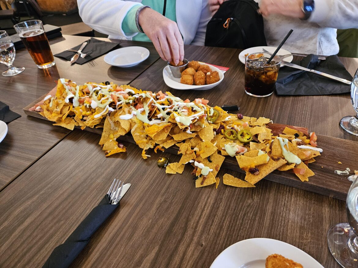 Overflowing Nacos on a Plank of Wood