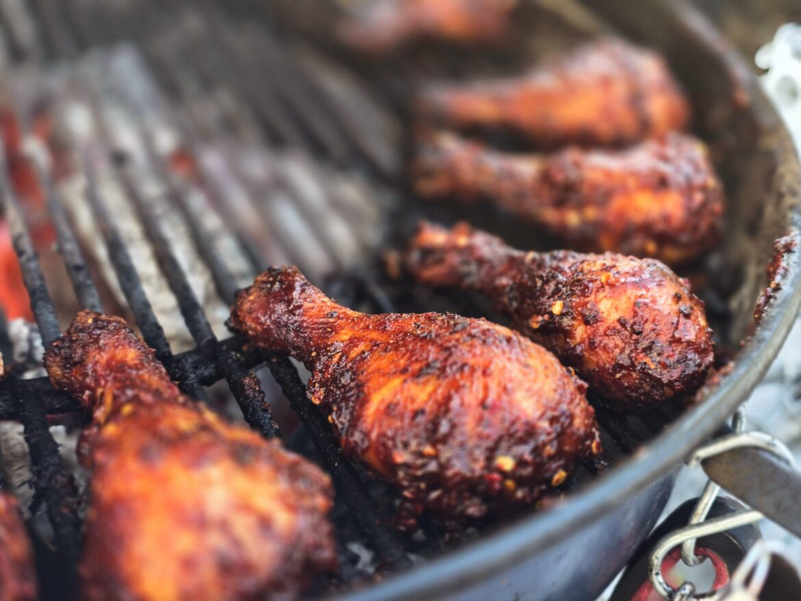 Chicken drums over coals with a sweet and spicy gochu BBQ sauce