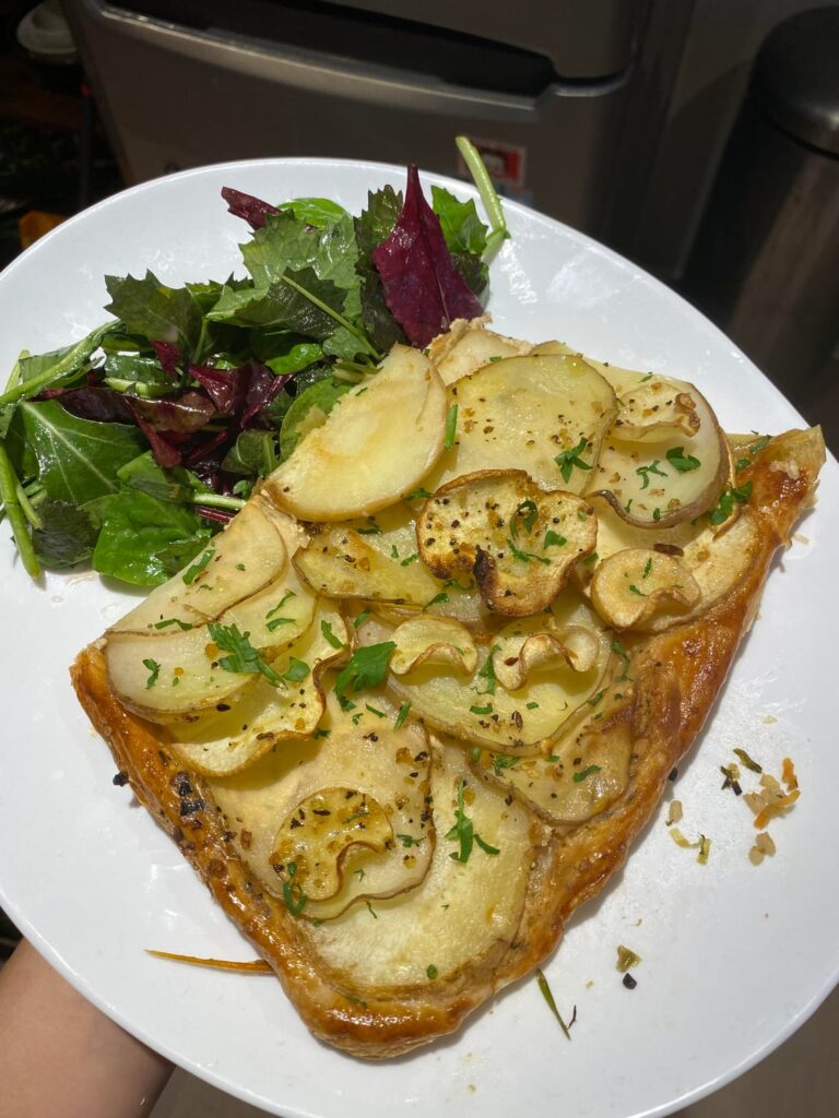 Threw a dinner party last night: parsnip and potato goat cheese pie, tom yum prawn soup, egg fried new year cake (nian gao), lamb empanadas-esque, pickled mustard stems fried rice