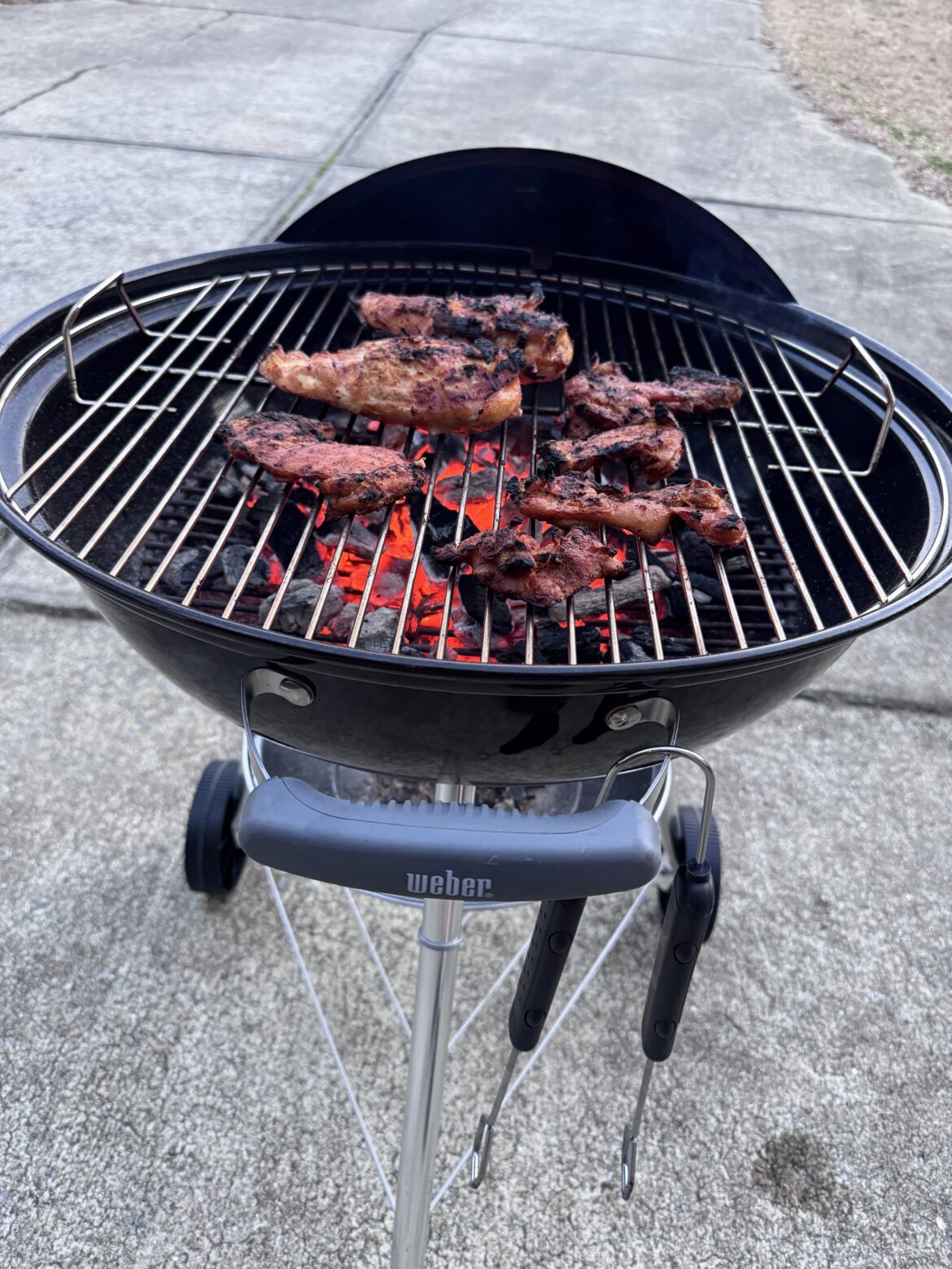 Char-Grilled chicken breasts and thighs. Diced up and served on a bed of yellow rice with queso on top.
