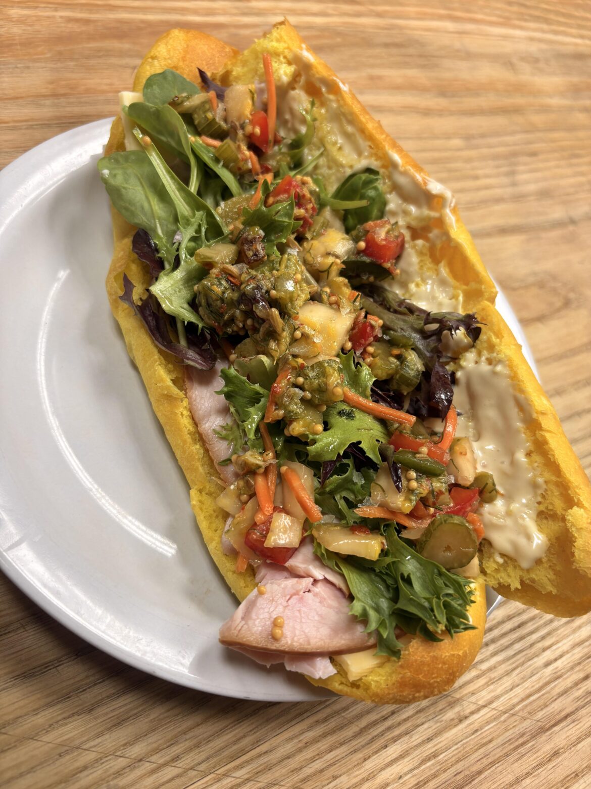 Smoked Gouda, turkey, giardineria, greens, mayo, homemade Cuban roll.