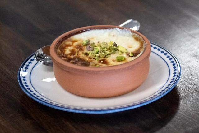 Rice pudding with pistachio from Kitchen Garden in Hills Plaza on Wednesday, Feb. 5, 2025.