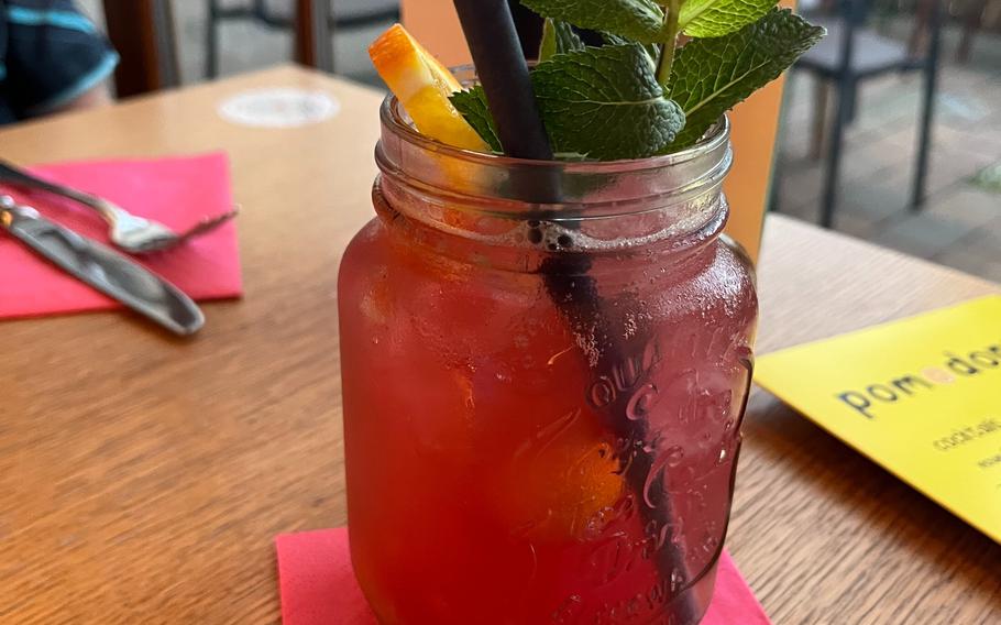 A mason jar filled with lemonade.