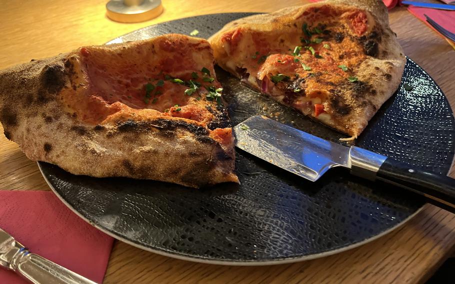 Pomodorino’s Giacomo calzone was a cosmic blend of fresh Italian ingredients and crispy, oven-fired dough at Pomodorino in Weiden.