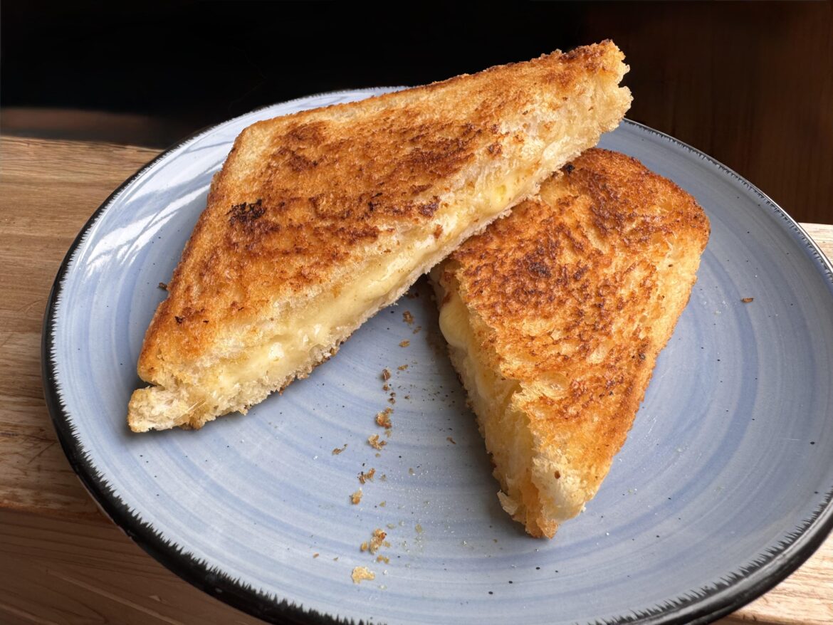 Bega tasty cheese on white bread cooked in a suitably buttery pan with a touch of salt