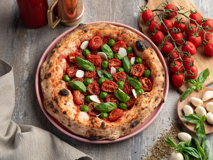 The chef-owner remains deeply committed to tradition when it comes to pizza-making. (© Little Napoli)