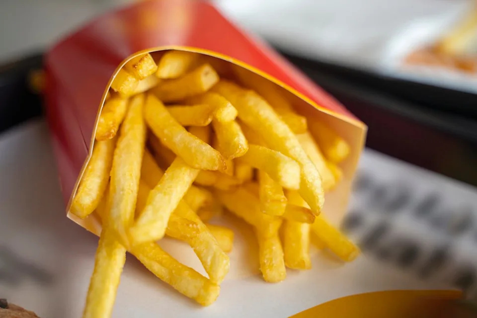 Researchers at the University of Illinois have reportedly found a way to make french fries that absorb less oil — and thus less fat — without losing their taste or crispiness by using a combination of traditional frying and a microwave (Getty Images)