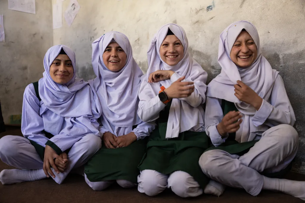 Girls smiling in Pakistan.
