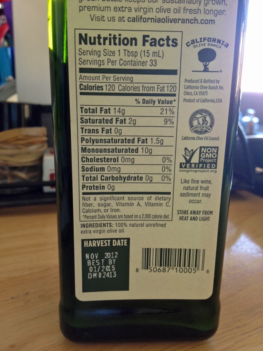 A bottle of California Olive Ranch oil with the harvest date.