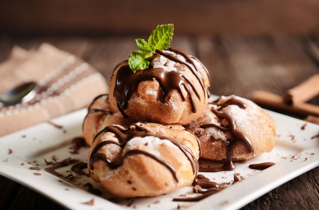 Profiteroles: What's better than a cream puff? A cream puff covered with chocolate.