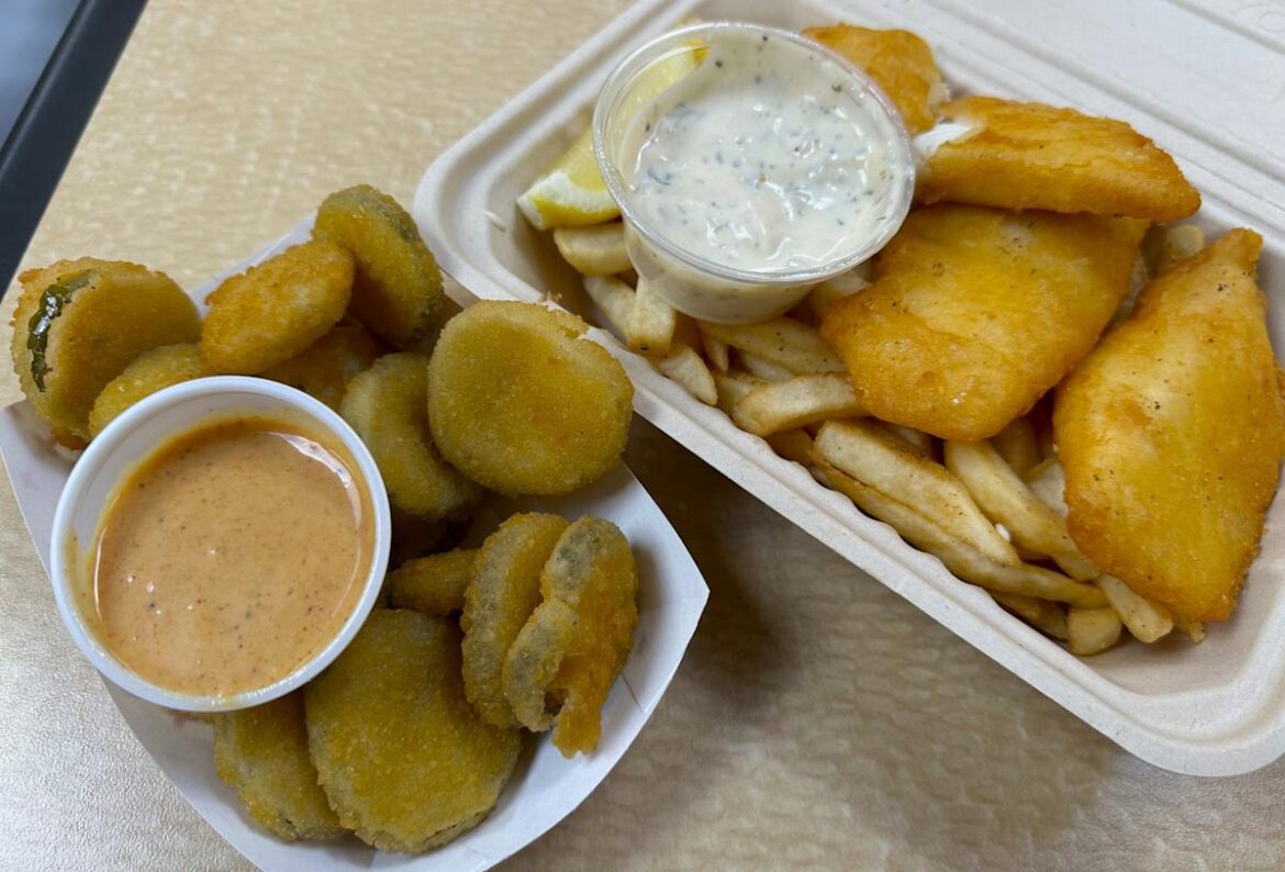 An order of cod and chips and an order of fried pickles from Oh My Cod, a new stall in the food court at Valley River Center.
