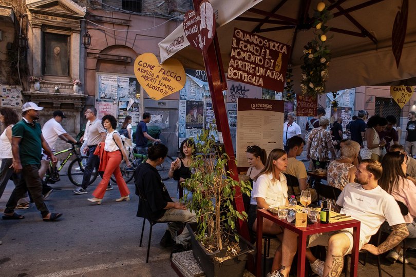 Patrons dine on Via Maqueda, a street in central Palermo, Sicily, Italy.