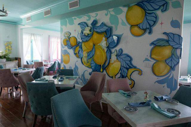 Colorful artwork painted by Coast tattoo artist Matt Stebly decorates the new Field’s Mediterranean restaurant in downtown Biloxi.