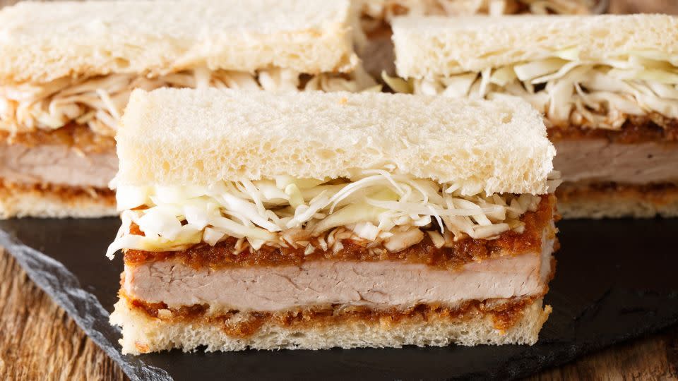This pork cutlet sando is a popular snack in Japan. - FomaA/Adobe Stock