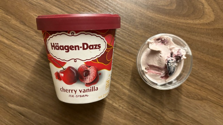 Häagen-Dazs Cherry Vanilla Ice Cream carton next to ice cream in glass ramekin