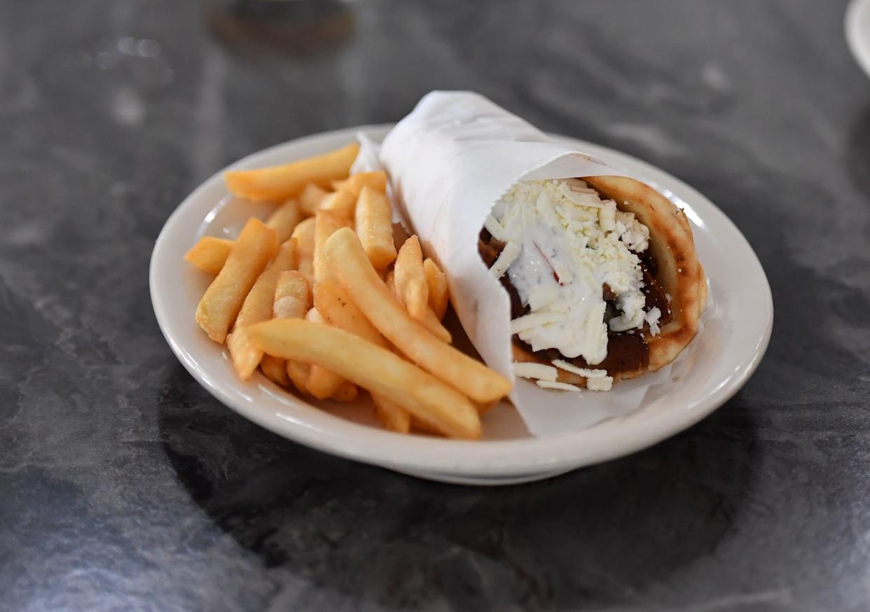 A gyro with fries is served at Hibiscus Cafe on April 9. The family-owned restaurant specializes in Greek food and delicacies. It is located at 4114 Burkburnett Road, Suite No. 6, in Wichita Falls near Sheppard Air Force Base.