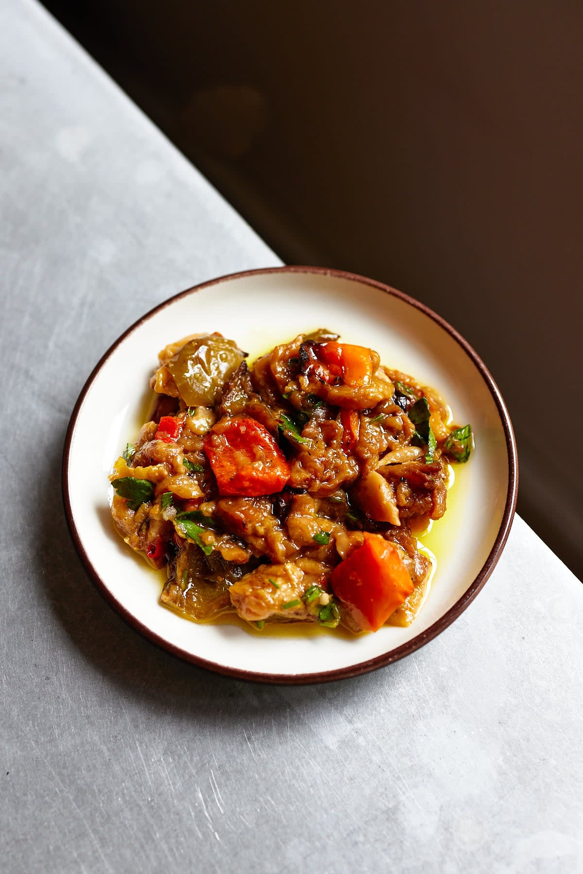 Smoky aubergine, slow-cooked spice, and the reason one plate of bread is never enough (Safia Shakarchi)