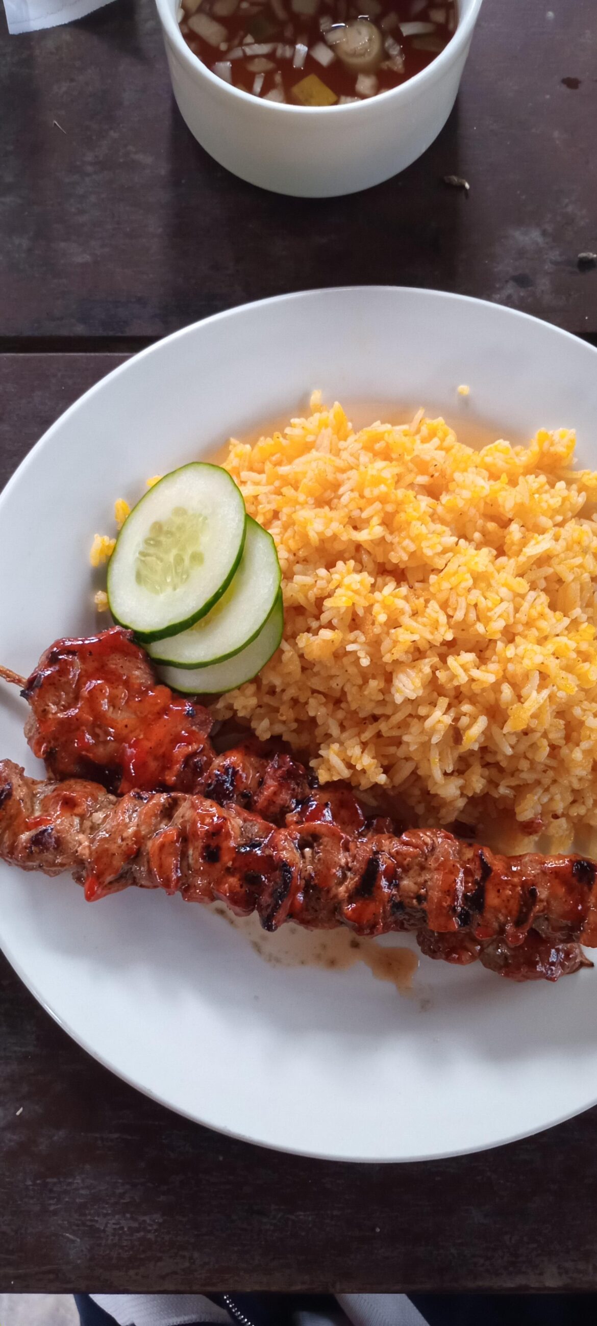 Filipino pork BBQ skewers glazed in sweet soy marinade, served with java rice Perfect combi!<3