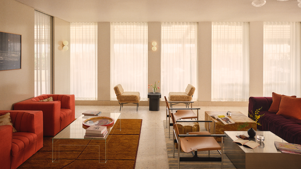 Modern lounge area with seating and decor.