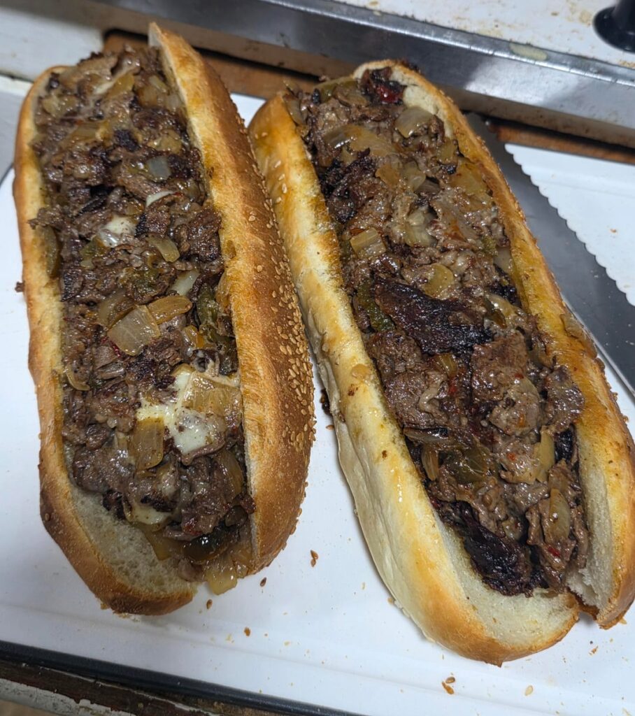 [Homemade] Upped my cheesesteak game with Homemade seeded rolls.