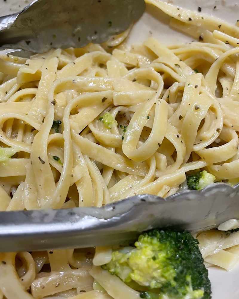 Pasta and broccoli made with Yo Mama's alfredo sauce.