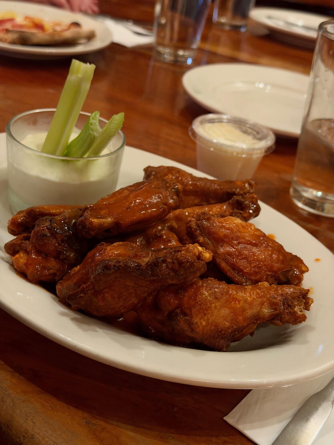 Hot buffalo wings. John’s Pizzeria of Times Square.
