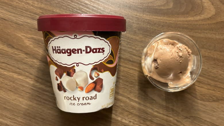 Häagen-Dazs Rocky Road Ice Cream carton next to ice cream in glass ramekin