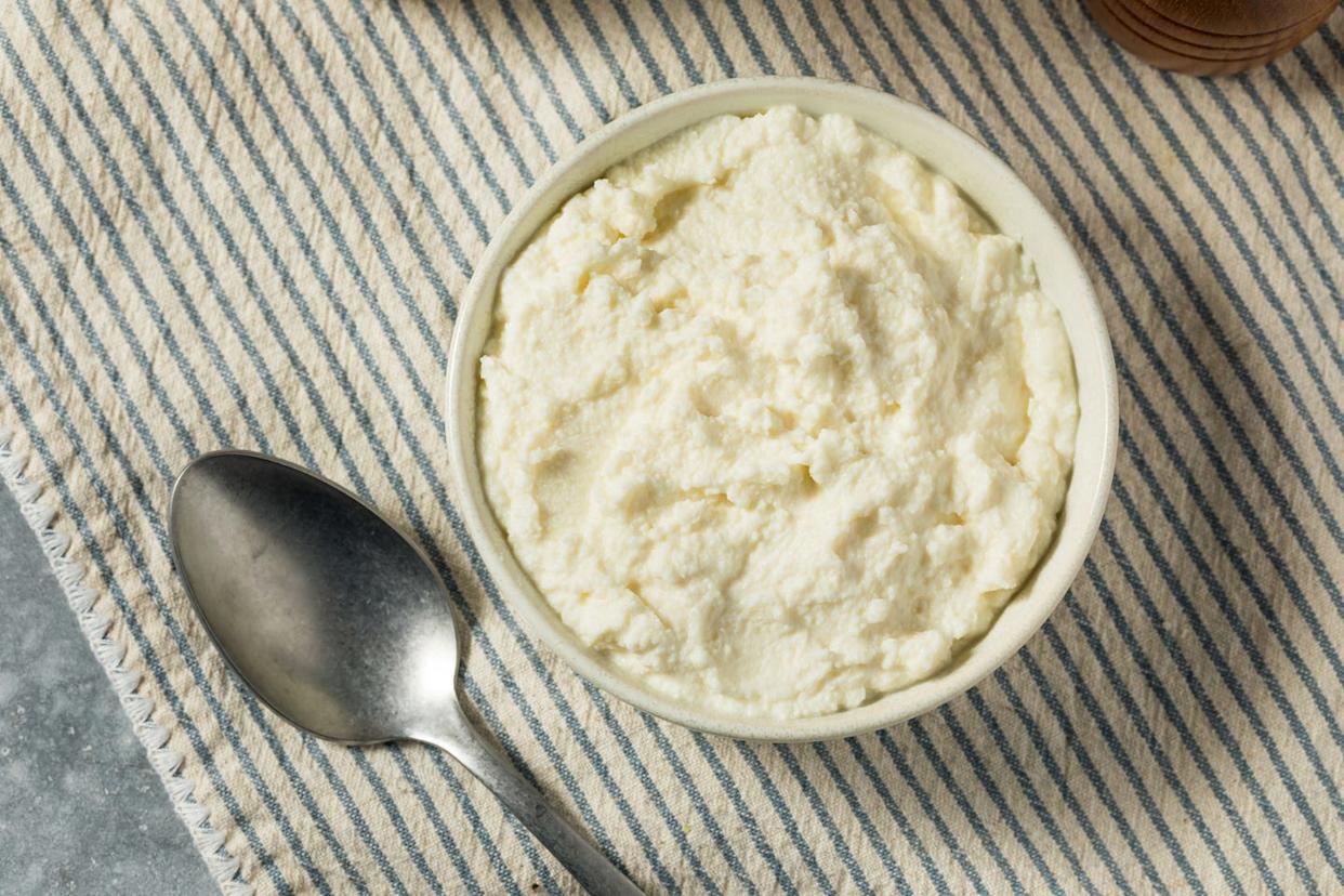 white whole milk ricotta cheese in a bowl