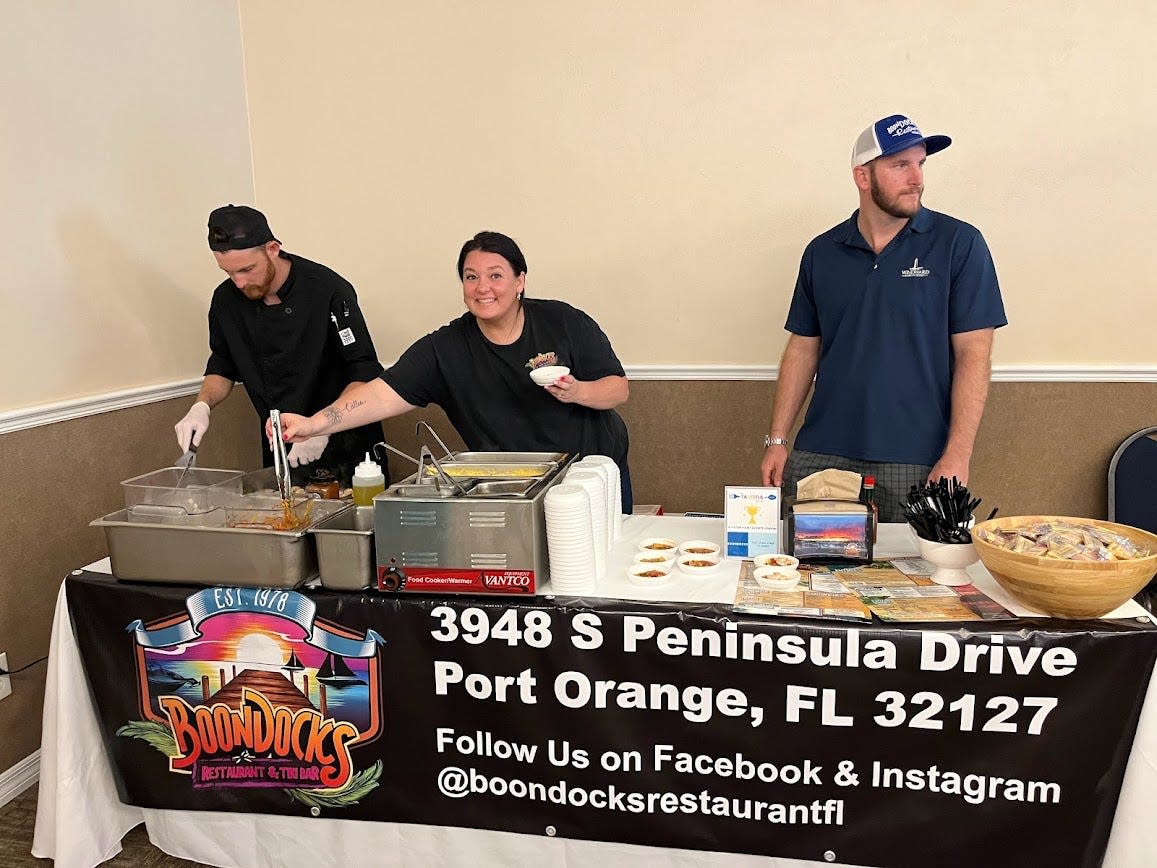 2023 - 2024 Tasteful Affair champion, Boondocks, shows off its booth at the annual fundraising event.