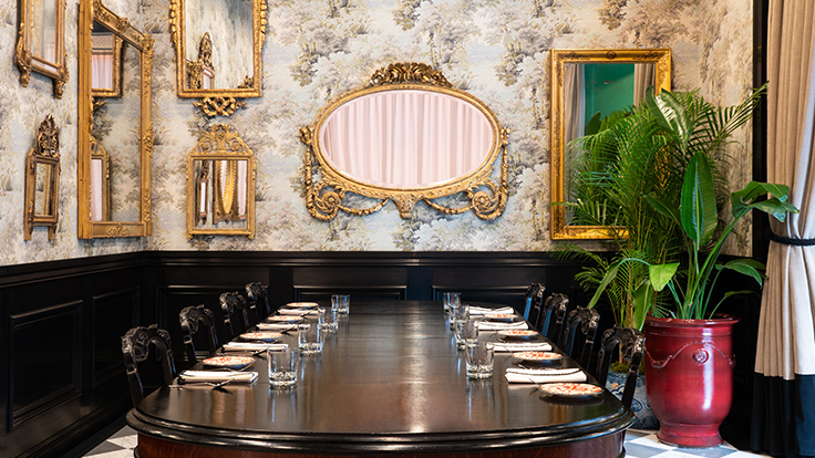 The interior reflects the world of Gucci through vivid colors, including a striking mirrored private dining room.(© Gucci Osteria da Massimo Bottura Tokyo)