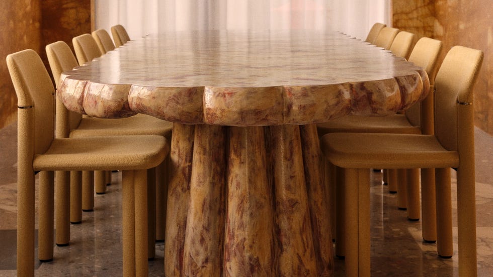 A modern dining setup featuring an artistic table and chairs.