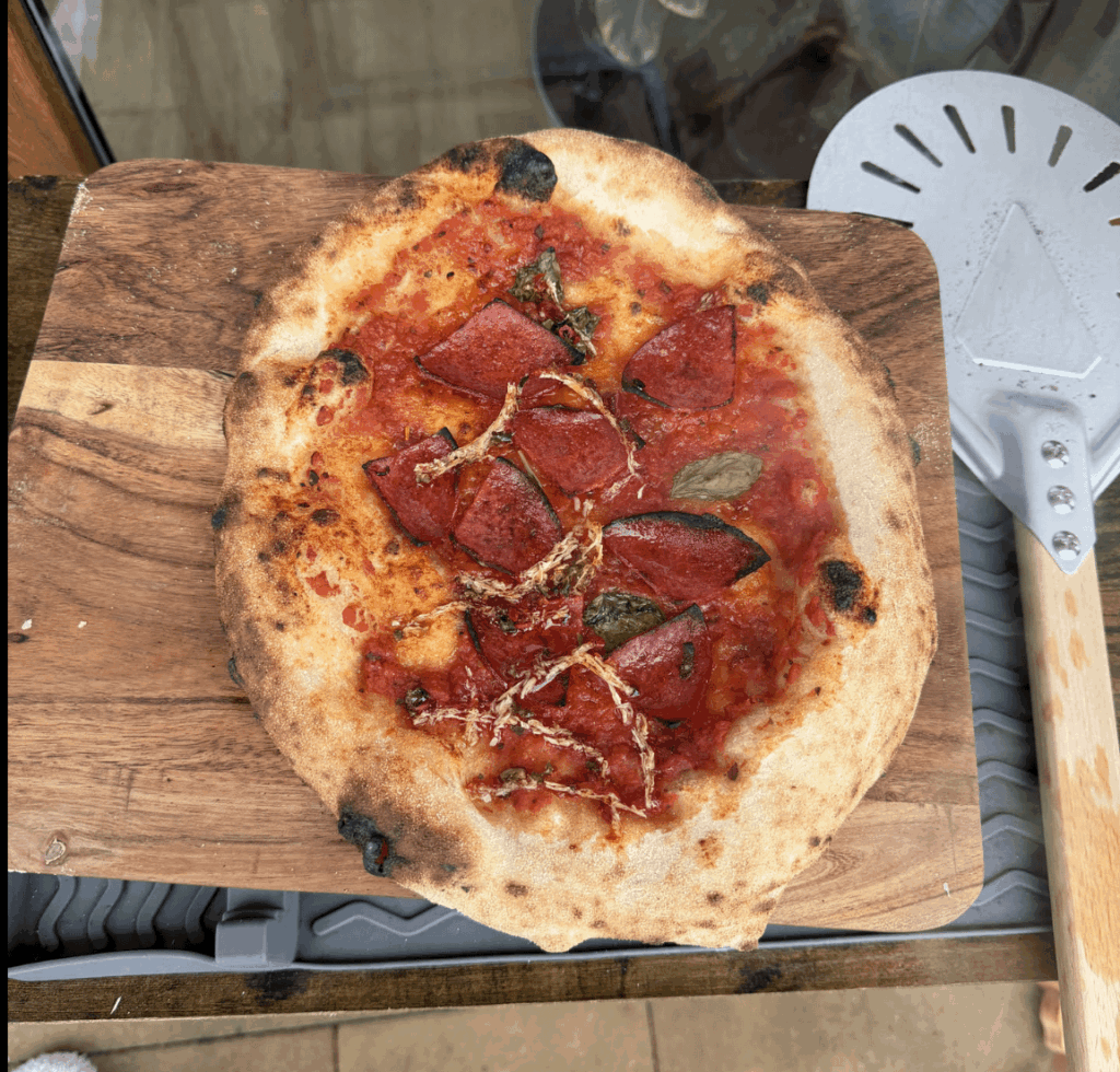 Salami, Pecorino Romano and fresh Basil on Vera Blue Salami, Pecorino Romano and fresh Basil on Vera Blue