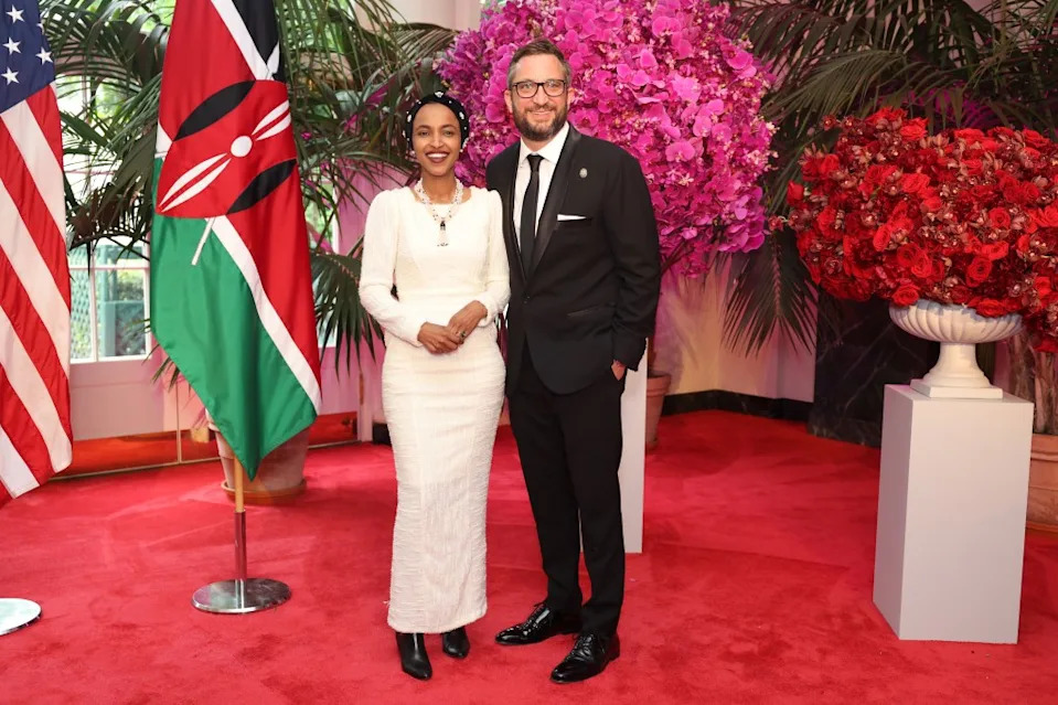 Representative Ilhan Omar, a Democrat from Minnesota, left, and Tim Mynett at a state dinner. Bloomberg via Getty Images