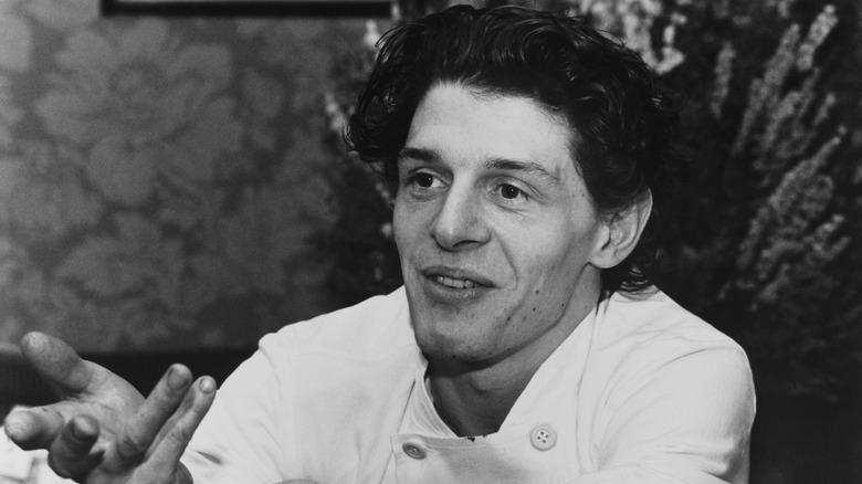 Black and white photo of a young Marco Pierre White